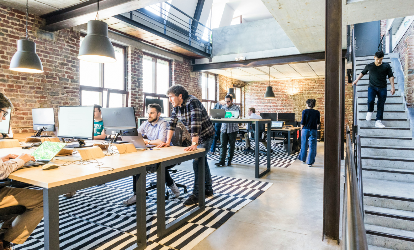 DOT Europe team working in an open-plan office
