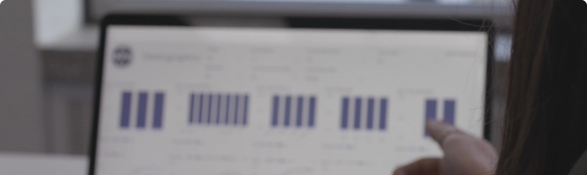 Person viewing analytics dashboard on a laptop